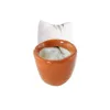 Centered on the back of  pot (1.5×1.5cm)  +